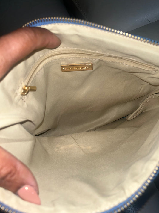 The Amicae Denim clutch