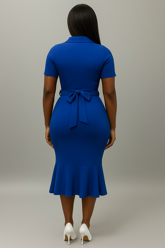 Woman wearing a royal blue zeta phi beta inc. dress with a belt back view