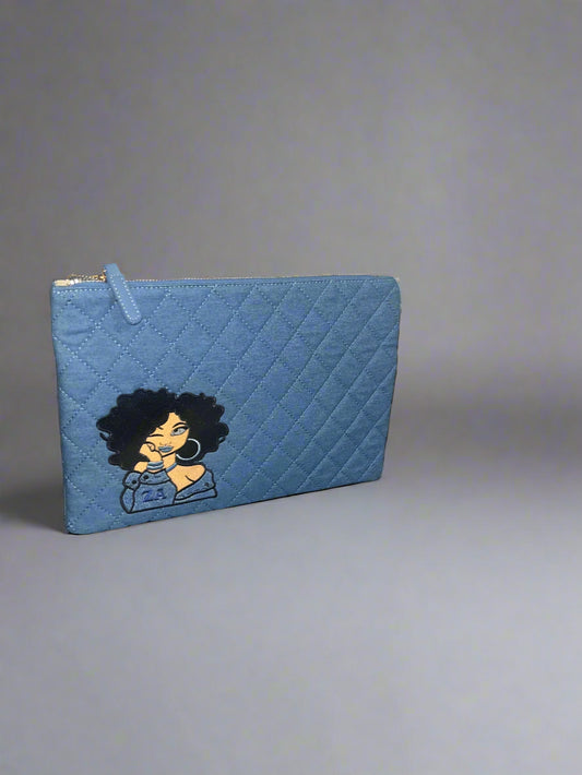 The Amicae Denim clutch