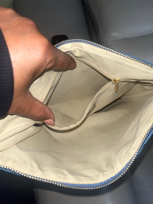 The Amicae Denim clutch