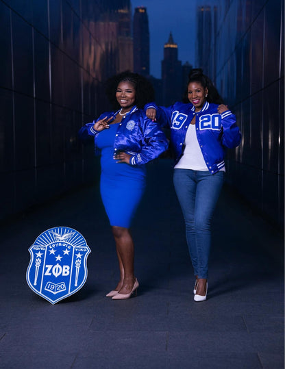 The 1920 Patent Leather Satin Bomber is a royal-blue satin jacket with bold “1920” across the chest. It runs true to size, with the option to size up for a looser fit. A sleek, statement Zeta piece perfect for any Finer wardrobe.