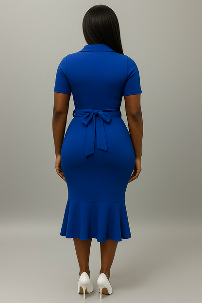 Woman wearing a royal blue zeta phi beta inc. dress with a belt back view