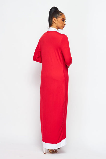 Step out in style with the Dusted with Red Duster featuring the iconic Delta DST symbol. This lightweight duster with convenient pockets is perfect for layering over any outfit, combining comfort, function, and Sorority pride.