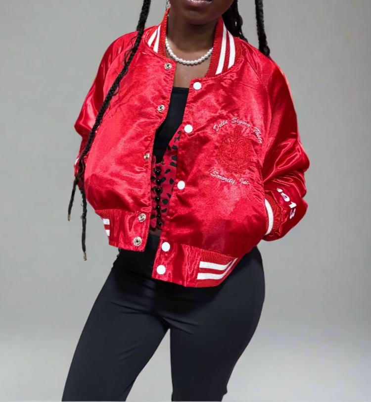 This Crimson Satin Oversized Cropped Jacket delivers a bold DST look with a smooth, luxe finish. Designed with an intentionally oversized fit for a relaxed, stylish silhouette. You may want to size down for a closer fit.