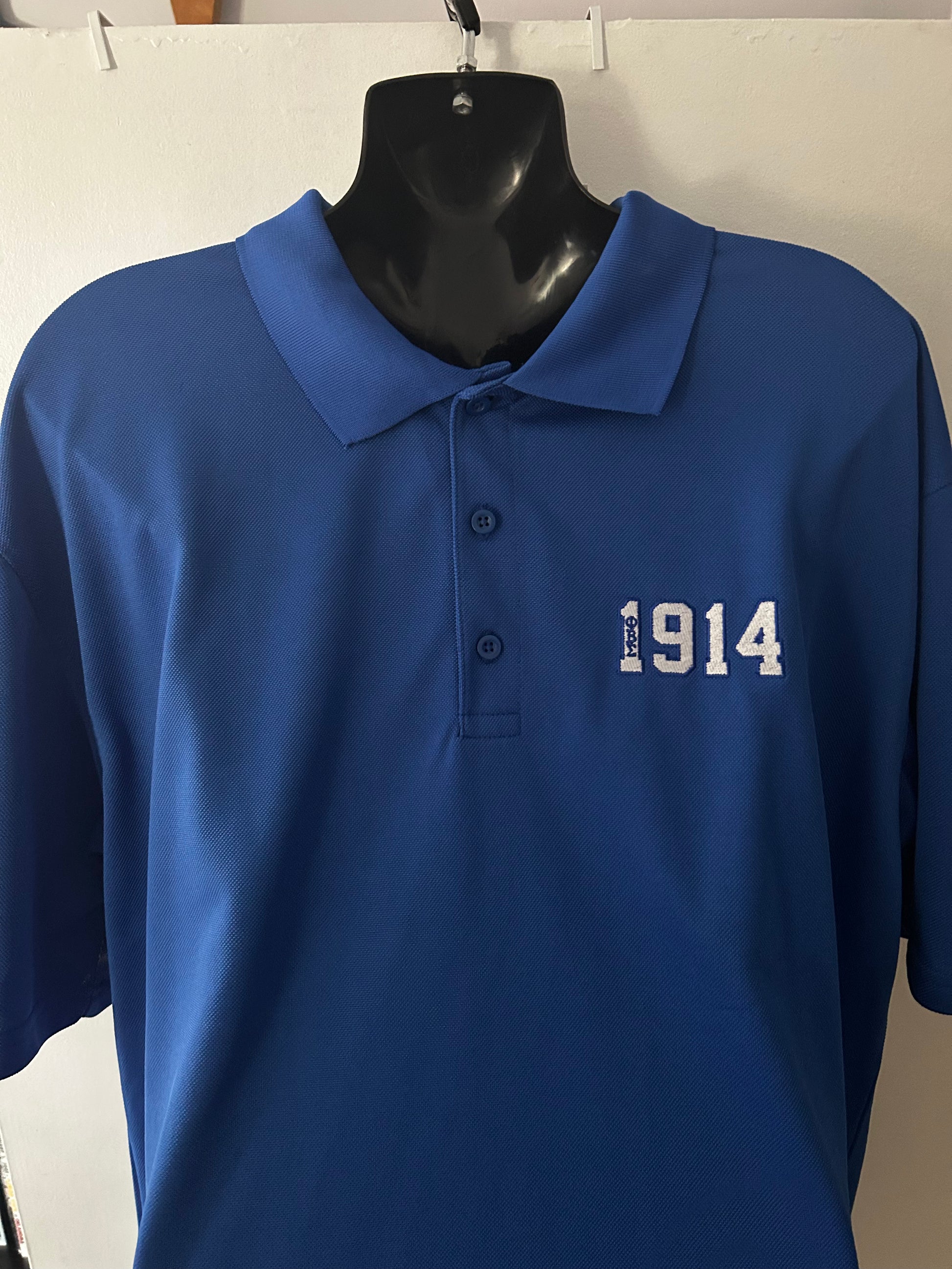 Show your Sigma pride in this classic 1914 Polo, designed in a rich royal blue with a clean embroidered style “1914” detail on the chest. Lightweight, breathable, and perfect for chapter events, conferences, or everyday Fraternity style. A timeless, comfortable piece every Sigma man can wear with confidence.