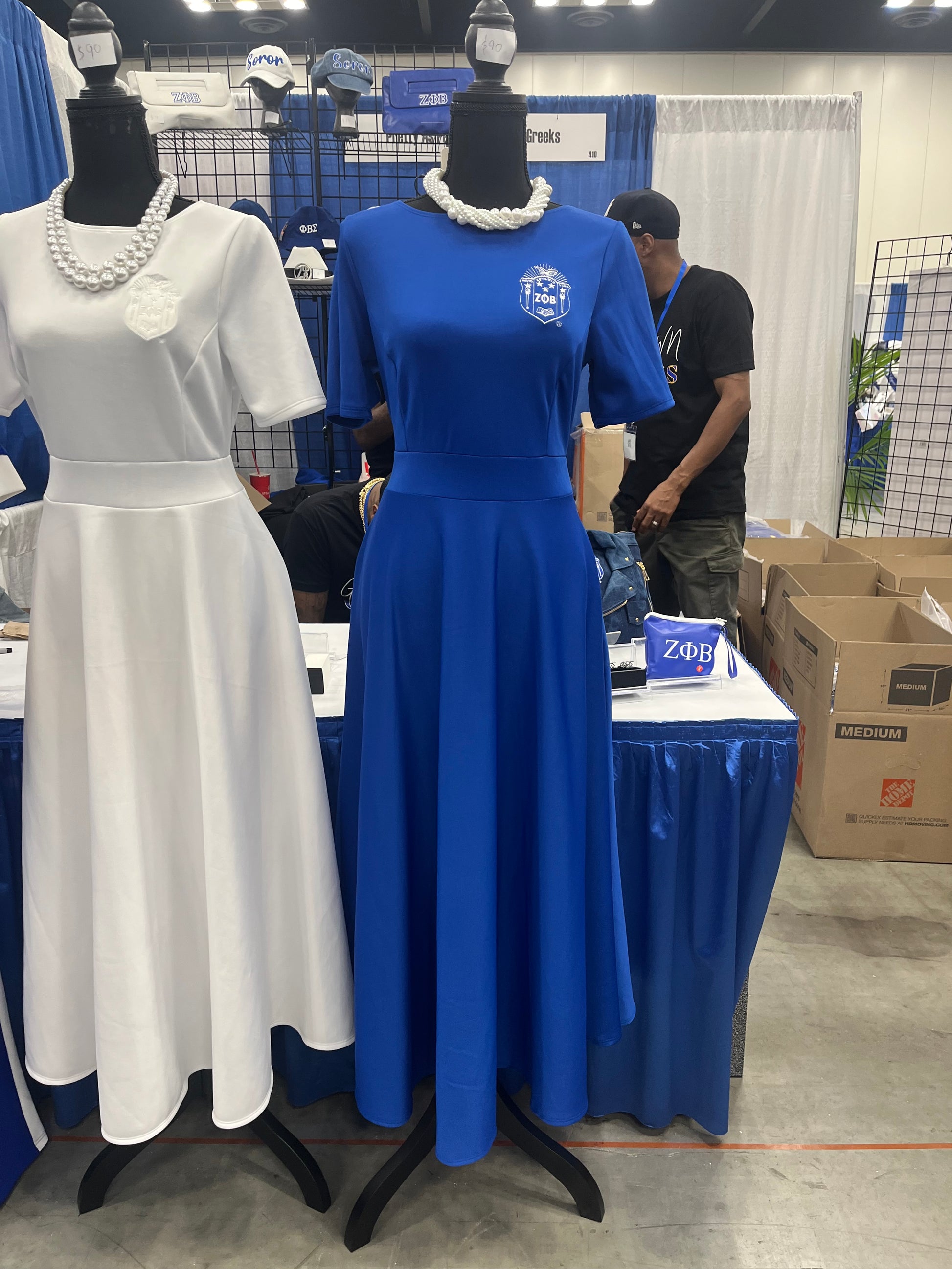 The Audrey is an A-line dress with an empire waist and convenient pockets. Made from thin yet forgiving scuba material, it fits true to size, with the option to size up if you’re top-heavy. Perfect for stylish comfort at any ΖΦΒ event.