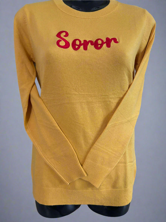 The Soror Southern Sweater offers a cashmere-like feel with a soft, cozy touch. Designed for everyday comfort, it gives that perfect Southern DST vibe. Fits true to size for an easy, flattering wear.