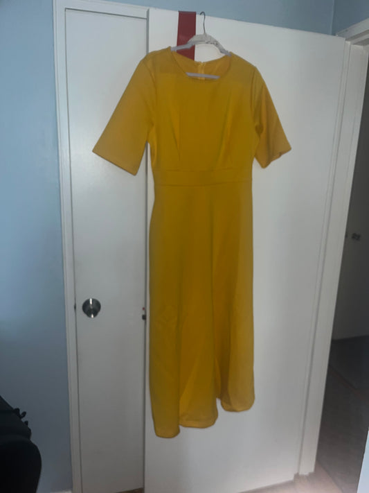 The Thera Phi Delta Kappa dress is crafted from lightweight scuba fabric that smooths and flatters every curve. Designed to keep you confident, it subtly hides what you don’t want to be seen. Perfect for any Greek event where elegance meets comfort.