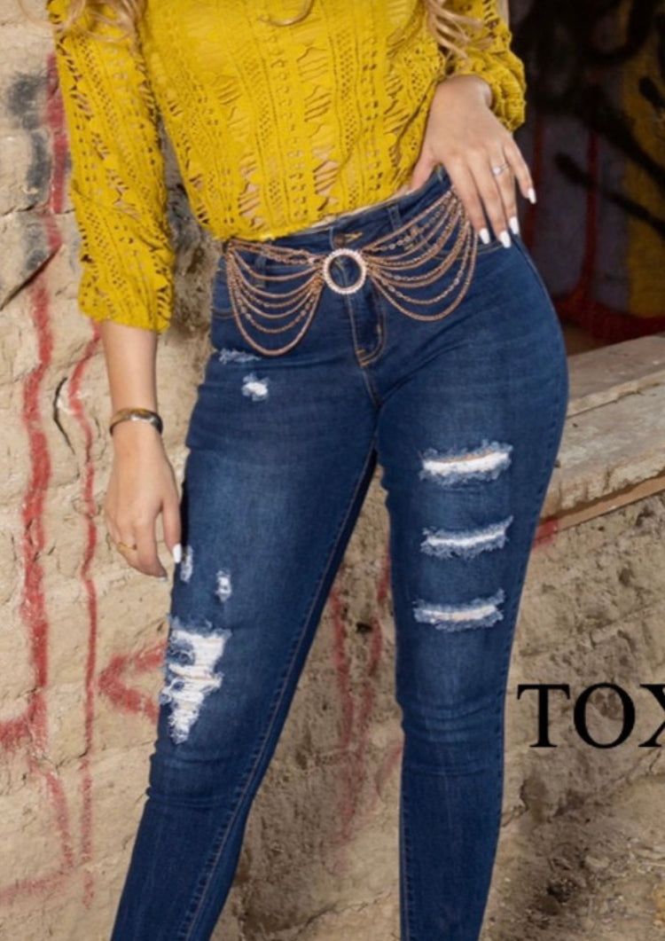 Show off your shape in these dark denim distressed jeans. Designed with sexy stretch fabric that hugs your curves and adds edge to any outfit.