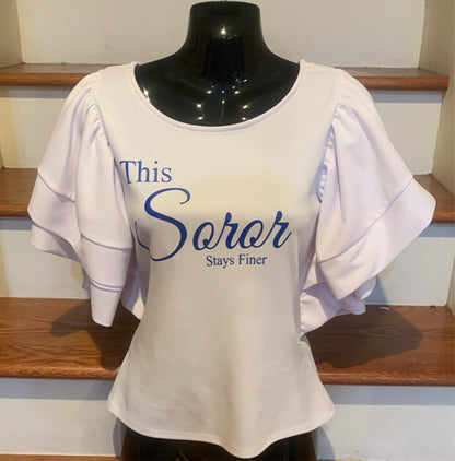 Elevate your style with the Finer Soror Blouse, an all-white blouse featuring elegant, ruffled sleeves and a plunging back for a look that’s both sexy and classy. Perfect for brunches, events, or a stylish day out, this blouse combines sophistication with a touch of boldness. 