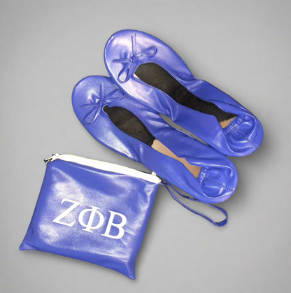 Flats The Zeta Way are designed for comfort, versatility, and subtle Zeta flair. The flats feature a lightly padded insole and flexible UV material that stretches for a perfect fit. The matching bag showcases the ZΦΒ design, while the shoes themselves remain plain allowing you to wear them anywhere with ease. Perfect for travel, events, or everyday wear, these flats combine comfort and sisterhood-inspired style.