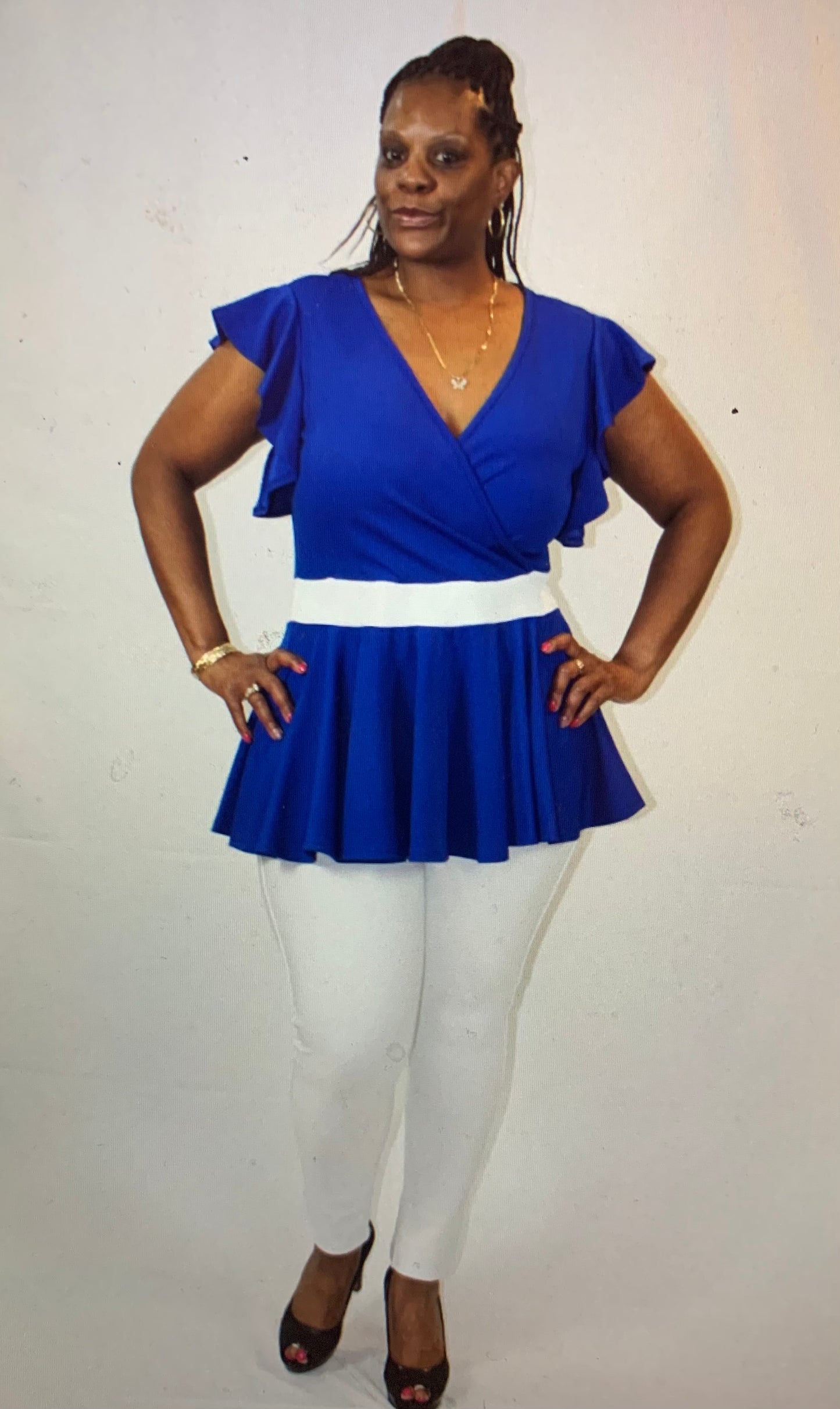 Add a touch of elegance with the Just a Bit of Flare top. Featuring flutter sleeves, a flattering peplum waist, and a royal blue and white color combo that makes any outfit pop.