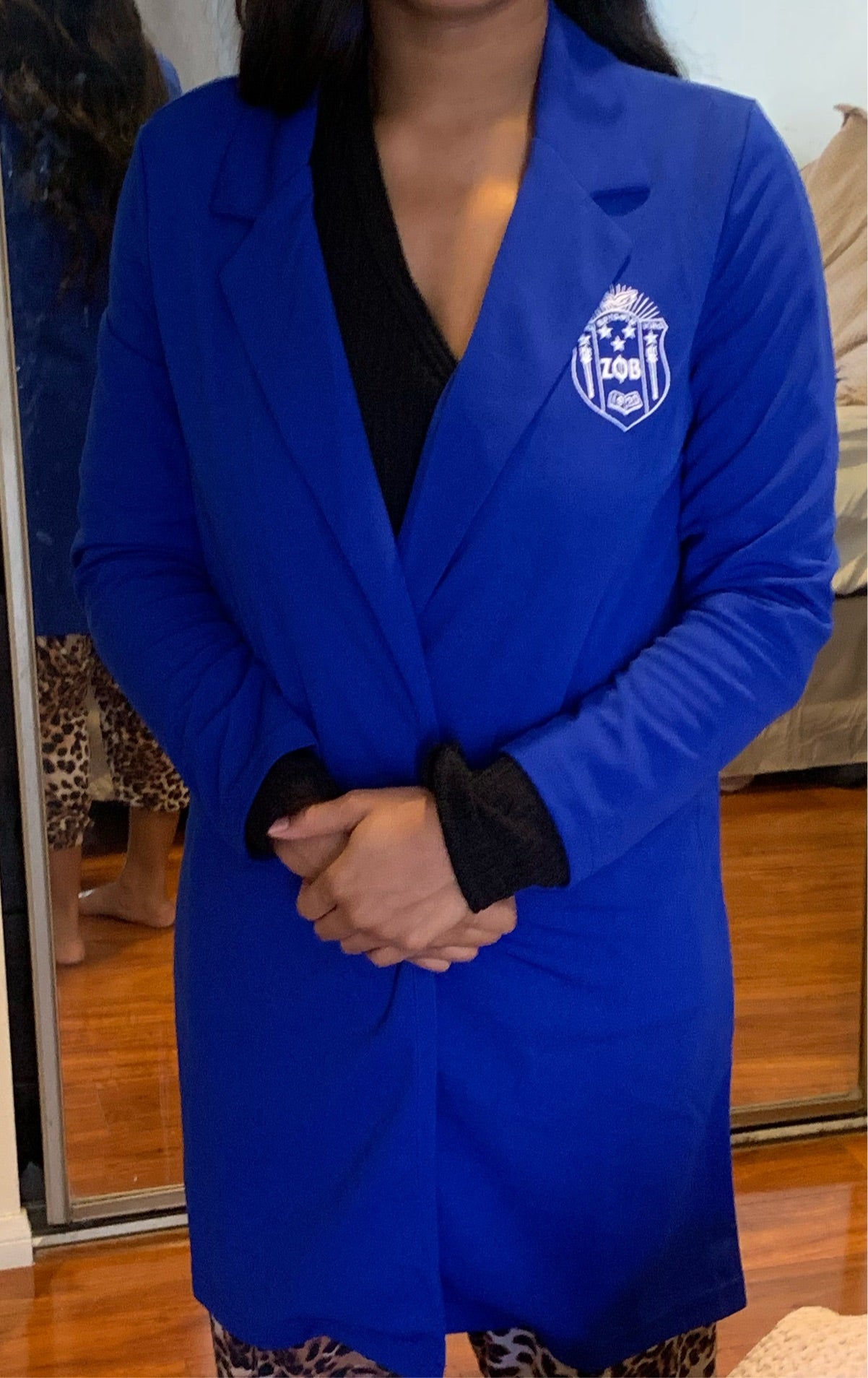 Command attention in the Long Royal Blue Business Blazer. This tailored piece features a sleek, professional fit with the Zeta Phi Beta shield on the chest. Perfect for conferences, meetings, and events where style meets Soror pride.