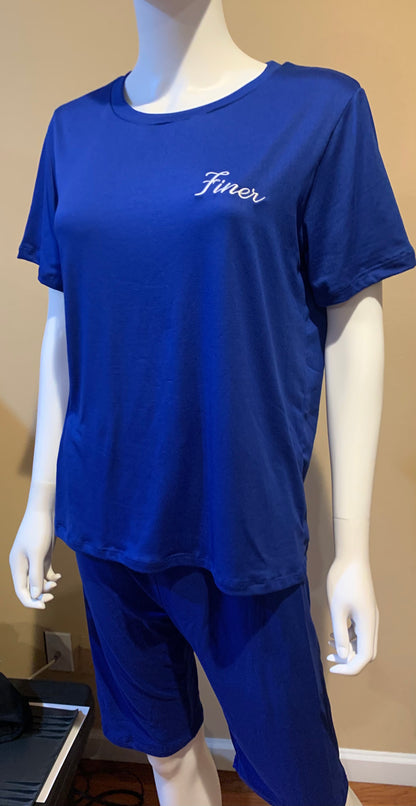 Plus Finer Biker Short Set – 2-piece soft, stretchy set in royal blue or black with contrast lettering. Comfortable, flattering, and stylish for misses plus sizes. 