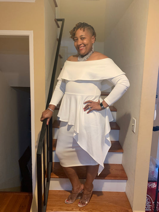 Soft off-white off-the-shoulder dress featuring a flared silhouette that moves beautifully with every step. Made to fit snugly, this stylish piece is perfect for evenings out, parties, or any occasion where you want a chic and feminine look.