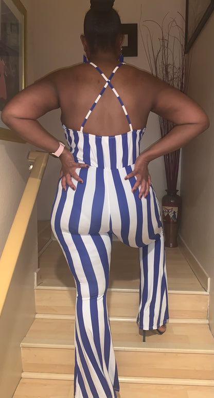 Blue and white striped women’s jumpsuit featuring a flattering flare leg, and spaghetti straps. Perfect for casual outings, parties, or Greek-life events, this stylish jumpsuit combines comfort and statement style in one look.