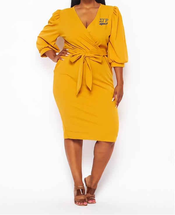 Step into elegance with The Chloe SGRHO Letters dress. This faux wrap dress features a flattering tie waist, three-quarter puff sleeves, and the Sigma Gamma Rho letters embroidered on the chest. Crafted for a sleek, confident fit perfect for conferences, chapter events, or classy outings. 